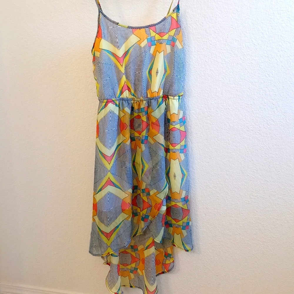 Free with purchase of bundles of 2 or more Great SPRING summer dress.  Size M